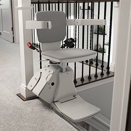 bruno elan straight stairlift top of the stairs