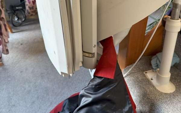Coat stuck in a stairlift